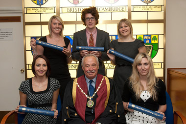 Students from St George's University, Grenada, attend a ceremony at the Royal College of Veterinary Surgeons, London, and are admitted to the college. L-R: Francesca Hendey, Matthew Foulkes, Jennifer Roberts. Front: Caroline Dennis, college president Dr Jerry Davies, Ashley Beresford. Wednesday 27/7/2011. Photograph &copy; Andrew McCargow